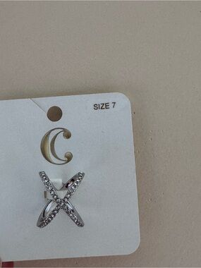Charming Charlie Silver X Ring with Clear Rhinestones